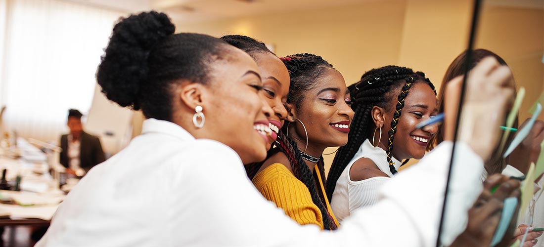 A team of South African business women work together to build a profitable start-up company.